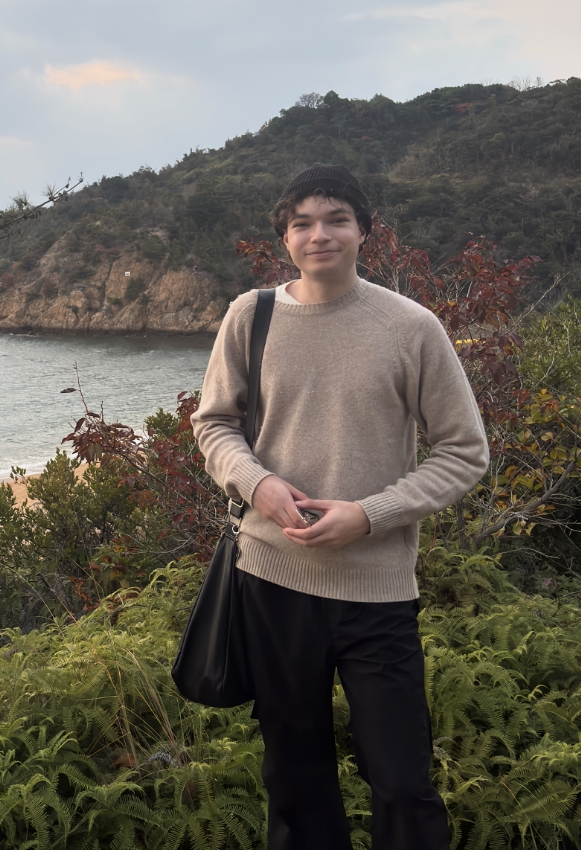 Jacob Chartrand outdoors by the coast